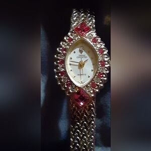 Sarah Coventry Gold Watch with Pink And Quartz Crystal Stones.